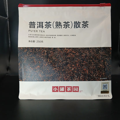 Pu'er tea package with text and branding on a dark background